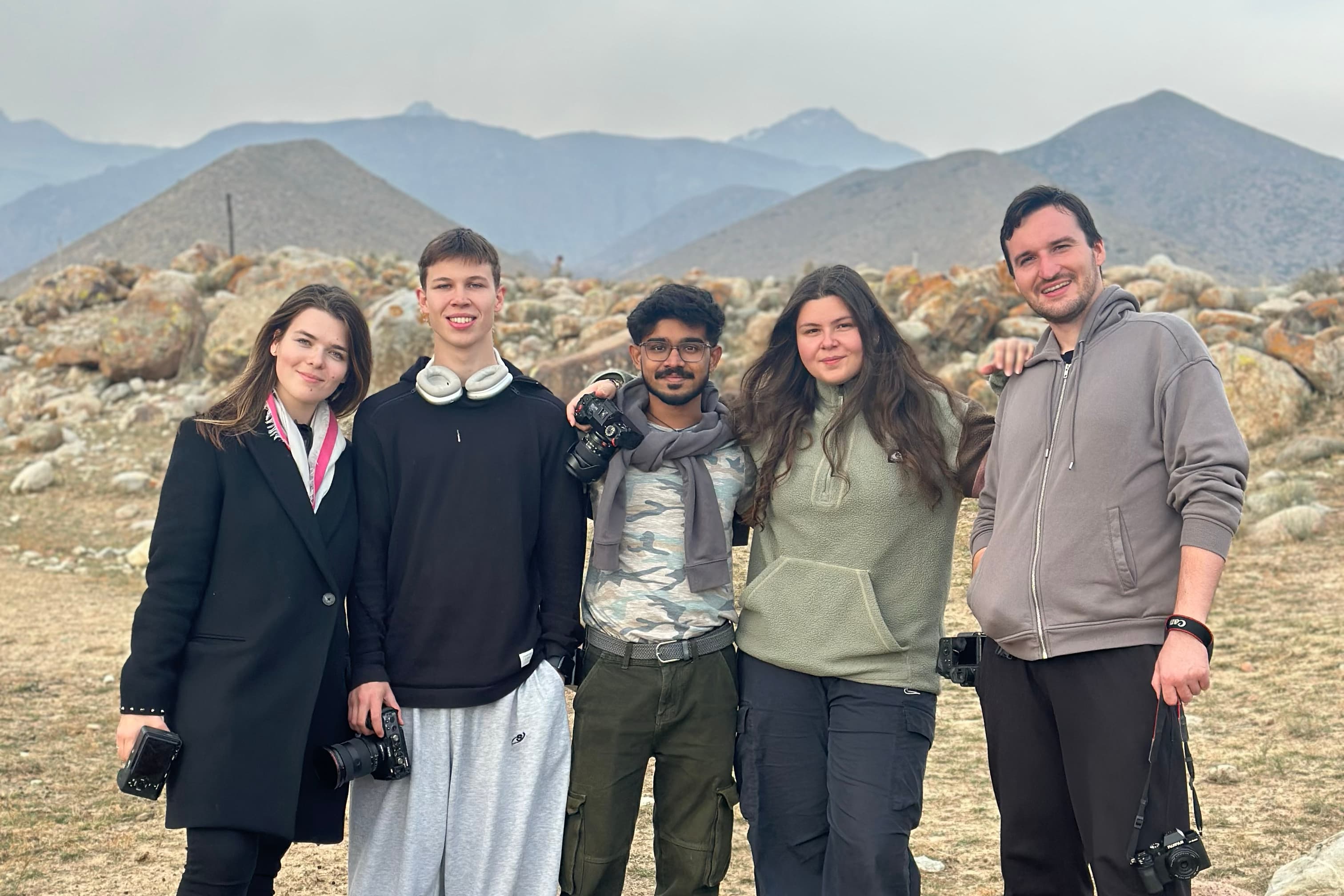 Expedition group portrait in a mountain landscape